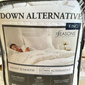 COPY - Brand new allergy  free down alternative kings size white comforter.